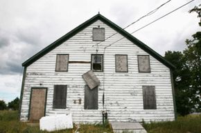 white abandoned home