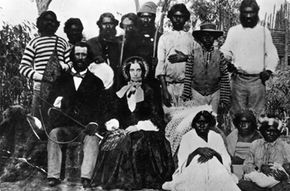 settlers surrounded by Aborigines