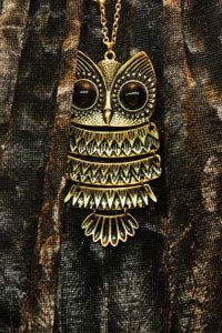Don't go overboard with your owl pendant -- it's charming enough on its own.