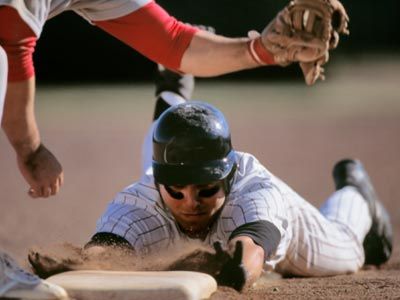 Athletic baseball player playing sport.