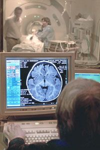 A doctor examines the results of a patient's MRI in Sao Paulo, Brazil 