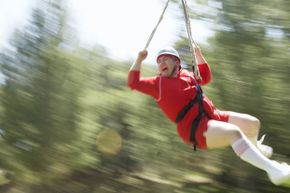 Screaming man on a zip line