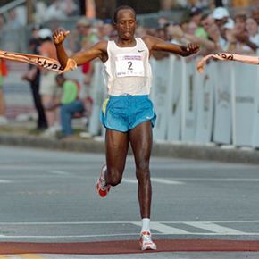 Martin Lel of Kenya crosses the finish line at the Peachtree Road Race in Atlanta on July 4, 2006. Lel won the Open Men's Division.