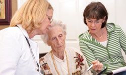 older woman with her daughter and her doctor