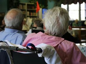 senior couple in wheelchairs