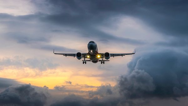 airplane among clouds