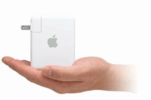 hand holding Apple Airport Express