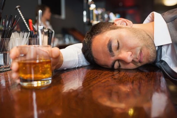 drunk man at bar