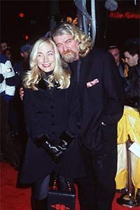 Joe Eszterhas and his wife attend the premiere of 'An Alan Smithee Film: Burn Hollywood Burn' in 1998 in Westwood, Calif. Eszterhas was the screenwriter of this box office bomb.