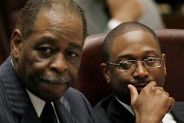 Chicago Aldermen William Beavers, left, and Todd Stroger