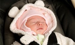 infant girl in car seat