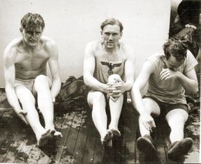 A German U-boat crew become POWs after their submarine was depth-charged in the Atlantic. In July 1943, the German navy withdrew from the Atlantic battle.