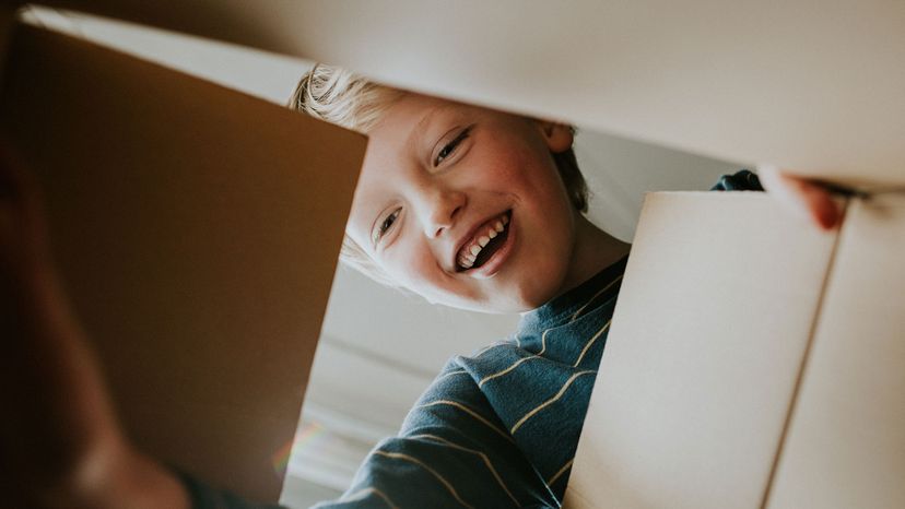 boy opens box