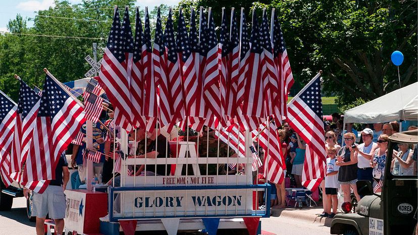 flag-decked float, 4th of July parade