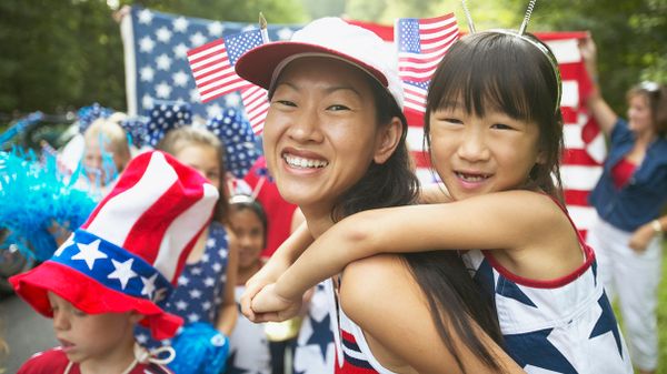 family in fourth of july parade