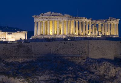 Acropolis, Athens, Greece. The Parthenon and Erechtheion (left) at night.