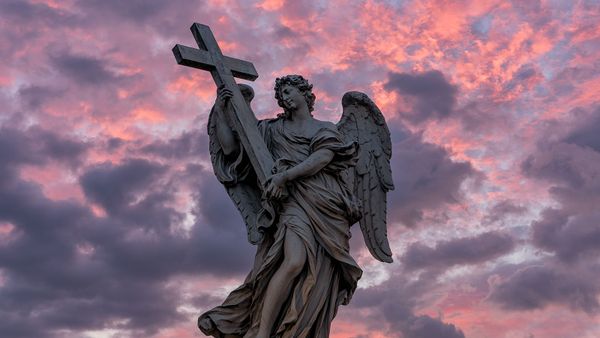 Bridge of Angels Statue At Sunrise