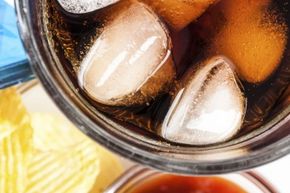 Crunching on the ice from your soda isn't a cause for concern, but if you compulsively eat large quantities of ice, it could be a symptom of a medical issue.