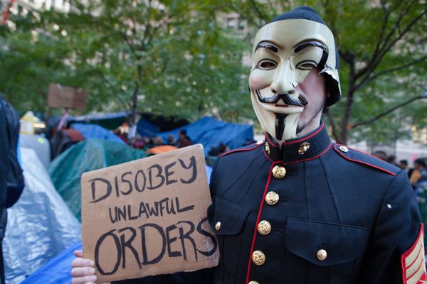 An Occupy Wall Street protester in Zuccotti Park on Oct. 30, 2011, the day after a nor'easter storm blanketed the area in snow.