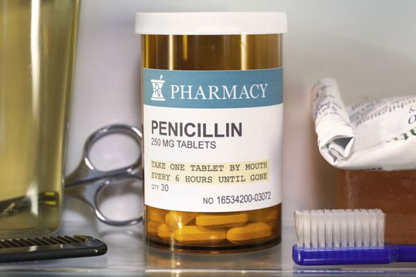 Bottle of penicillin in medicine cabinet.