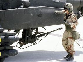 The M-230A1 30-mm automatic cannon on an AH-64A Apache