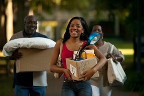 college freshman moving in to dorm, parents helping