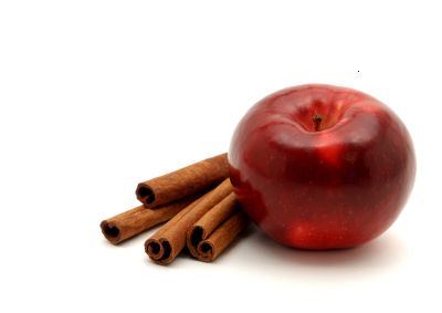 red apple and cinnamon sticks