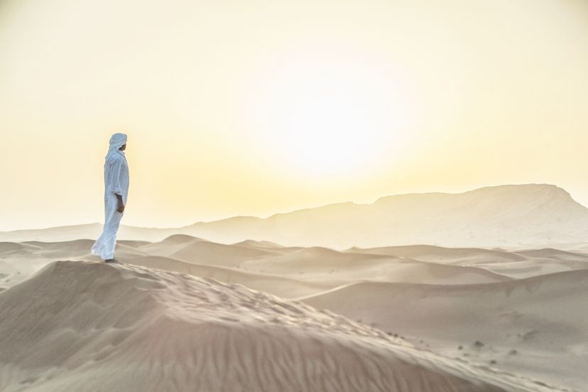 Arabian man standing in the Arabian Desert