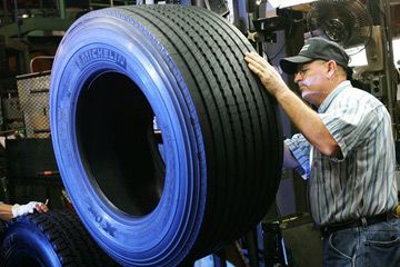 Jerry Alexander inspects the Michelin X-One truck tire at the Commercial Truck tire plant in Spartanburg, S.C.