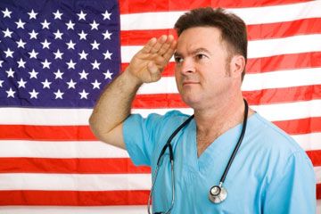nurse saluting American flag