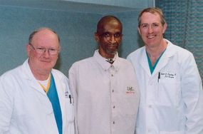 Patient Robert Tools with Dr. Laman Gray (left) and Dr. Robert Dowling (right)