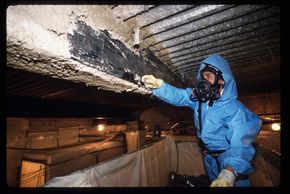 Numerous asbestos abatement firms have been established to remove asbestos, as seen in this 1988 photo.