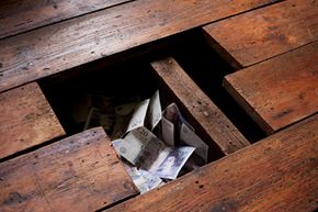 money hidden under floorboards