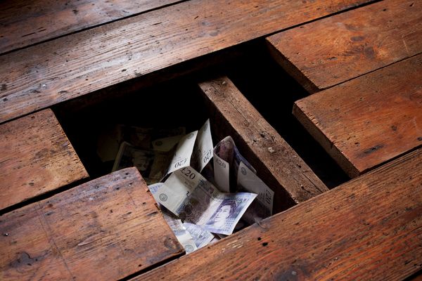 money hidden under floorboards