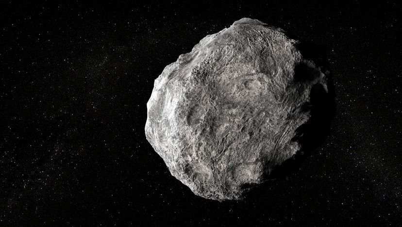 An artist's computer-generated interpretation of an asteroid in space. A large asteroid called Florence will pass relatively near to Earth on Friday, Sept. 1, 2017. Adnrzej Wojcicki/Science Photo Library/Getty Images