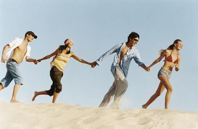 people running on beach