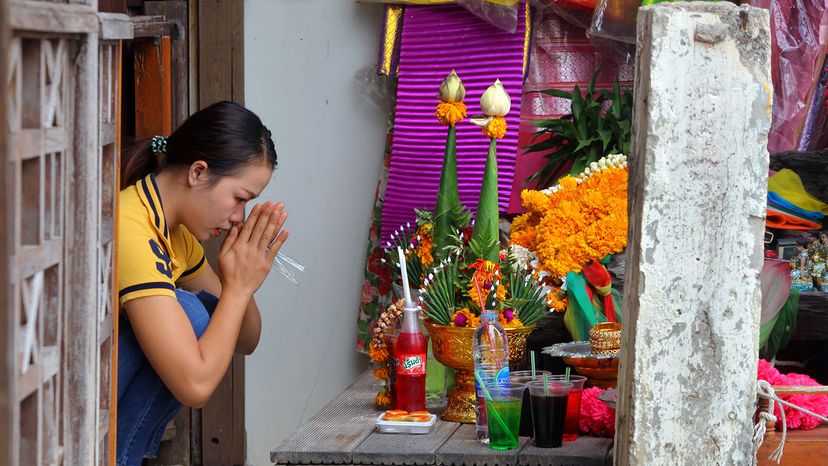 Thai woman, pray