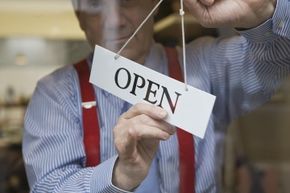 Guy with open sign