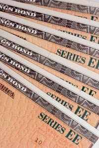 The government began phasing out all paper bonds, like these Series EE Savings Bonds, in favor of electronic bonds sold through TreasuryDirect.gov. See more investing pictures.
