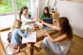 Family around computer. 