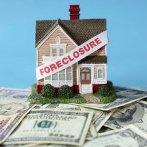 Illustration of foreclosed house and cash