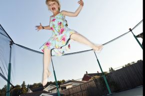 Trampolines can be fun, but you have to be aware of potential dangers. Get an enclosure, stick to one person jumping at a time, and always supervise children.  