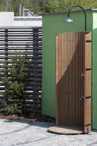 A wooden outdoor shower.&nbsp;