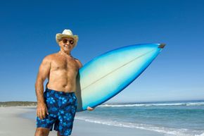 Person surfing outdoors on vacation in summer.