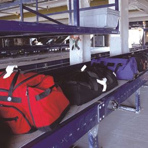 Bags lined up in a sorting station at the gate