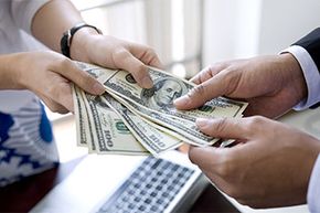 cash exchanging hands