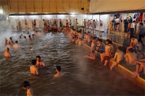 People crowd in this hot spring bath for its medicinal benefits in Garmisch Gul-Ardabil, Iran.
