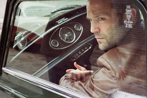 No Union Jack hot rod and velvet suit for Jason Statham in &quot;The Bank Job.&quot; The costume designers maintained a subtle '70s look.