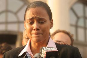 Marion Jones speaks to the media outside a U.S. federal courthouse in 2007 in White Plains, N.Y. after pleading guilty to charges in connection with steroid use.