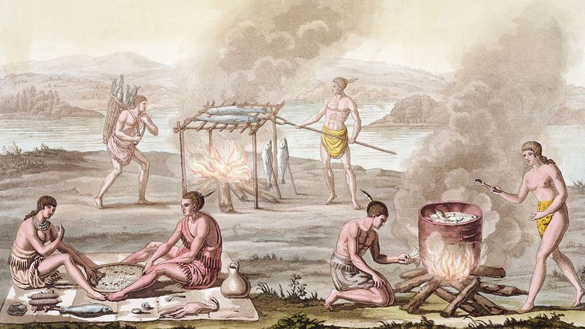 This print shows early Native Americans preparing fish in the style of barbecue. Historical Picture Archive/CORBIS/Corbis via Getty Images
